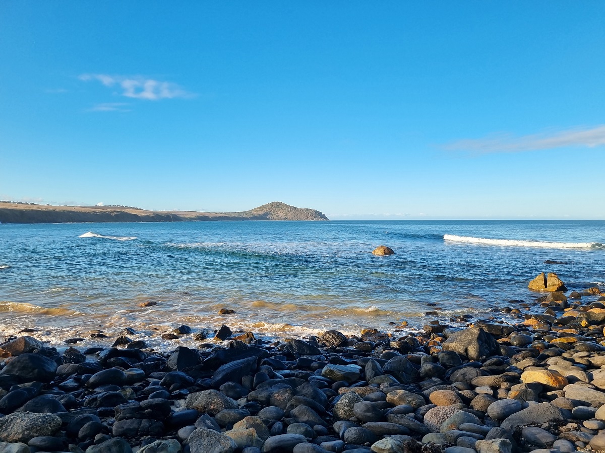 Rocky beach overlooking a seaside bay